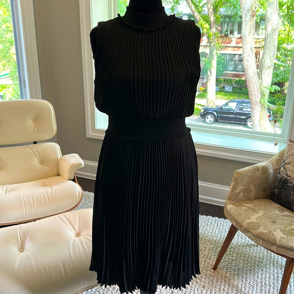 Black cocktail dress, flirty, black, comfortable, easy to pack. Size 12